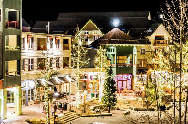 Traditional architecture meets modern living in this charming multi-story building with residential and commercial spaces.