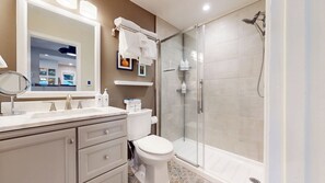 Shower, hair dryer, towels