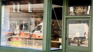 A storefront with a green facade and a sign that reads "Haus and Co Coffee." - 1st Floor, One Bed Apt & garden, Scottish Borders (Innerleithen)