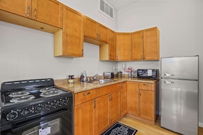 Fridge, microwave, coffee/tea maker, toaster