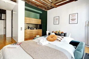 1 bedroom, desk, iron/ironing board, travel crib