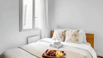 1 bedroom, desk, iron/ironing board, travel crib