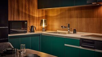 Full-size fridge, microwave, freezer, dining tables