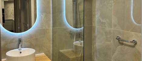 Hair dryer, towels, soap, toilet paper