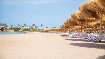 Private beach, sun loungers, beach umbrellas, beach towels