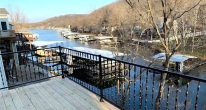 Lake Front Home with Boat Slip and swim platform dock