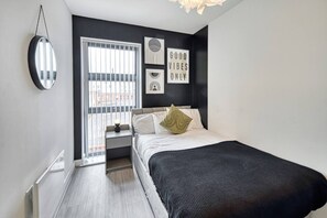 Apartamento | 2 quartos, ferros/tábuas de passar roupa, roupa de cama