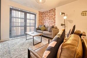 Apartamento, 2 quartos | Área de estar