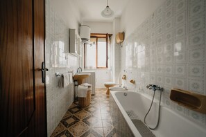 Hair dryer, bidet, towels, soap