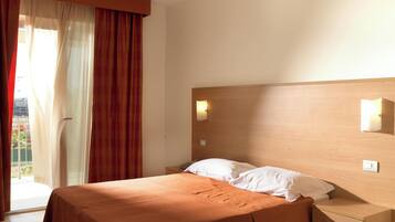 Apartment, Partial Sea View | 1 bedroom, cribs/infant beds, free WiFi