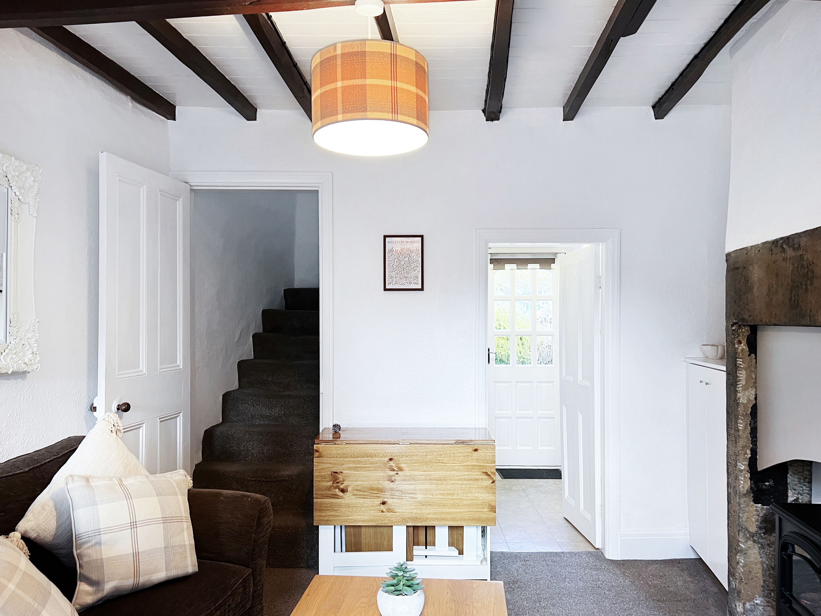 Lounge with staircase to the bedrooms