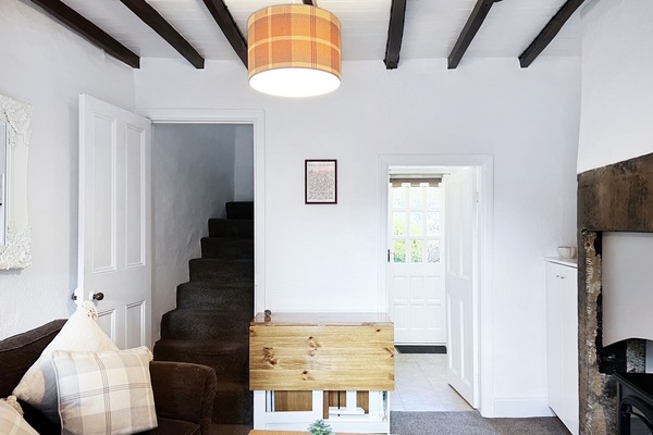 Lounge with staircase to the bedrooms