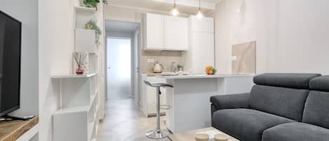 Comfort Apartment, City View | Living area | Flat-screen TV