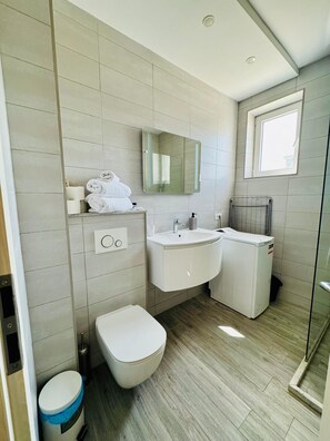 Hair dryer, towels, soap, toilet paper