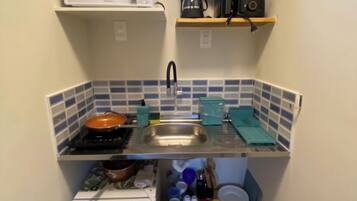 Comfort Apartment, Multiple Beds, Balcony, Garden View | Private kitchen | Mini-fridge, microwave, stovetop, cookware/dishes/utensils