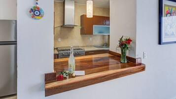 Fridge, microwave, cookware/dishes/utensils