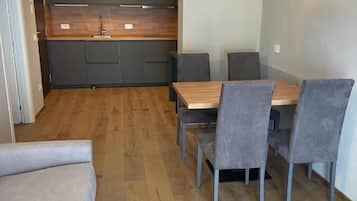 Apartment, Balcony | Living area | 32-inch Smart TV with cable channels