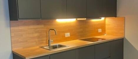 Apartment, Balcony | Private kitchen | Dining tables