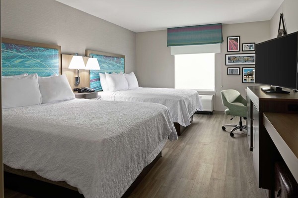 Settle into two plush beds for easy group comfort.