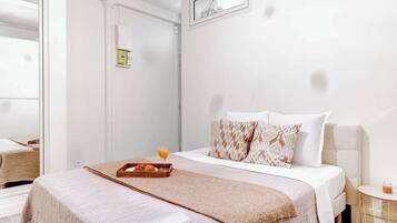 1 bedroom, desk, iron/ironing board, travel crib