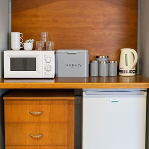 Suite estudio Confort | Espacio para trabajar con laptop y wifi gratis 