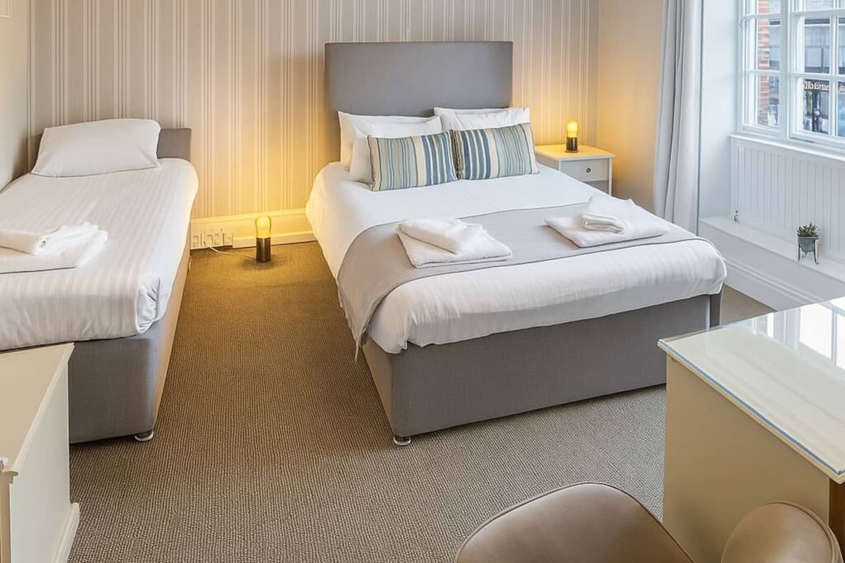 Laptop workspace, free WiFi, bed sheets