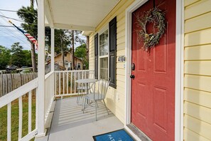 Welcome to 4104, where a charming porch invites you to step inside.