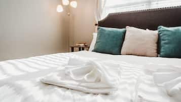 3 habitaciones, tabla de planchar con plancha, internet y ropa de cama