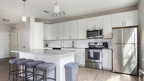 Fridge, dining tables - Landing | Incredible 1BD, Gym, Pool (Land O' Lakes)
