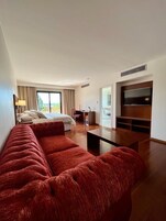 Premium bedding, free minibar items, in-room safe, desk