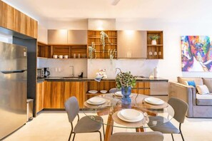 Fridge, microwave, stovetop, coffee/tea maker
