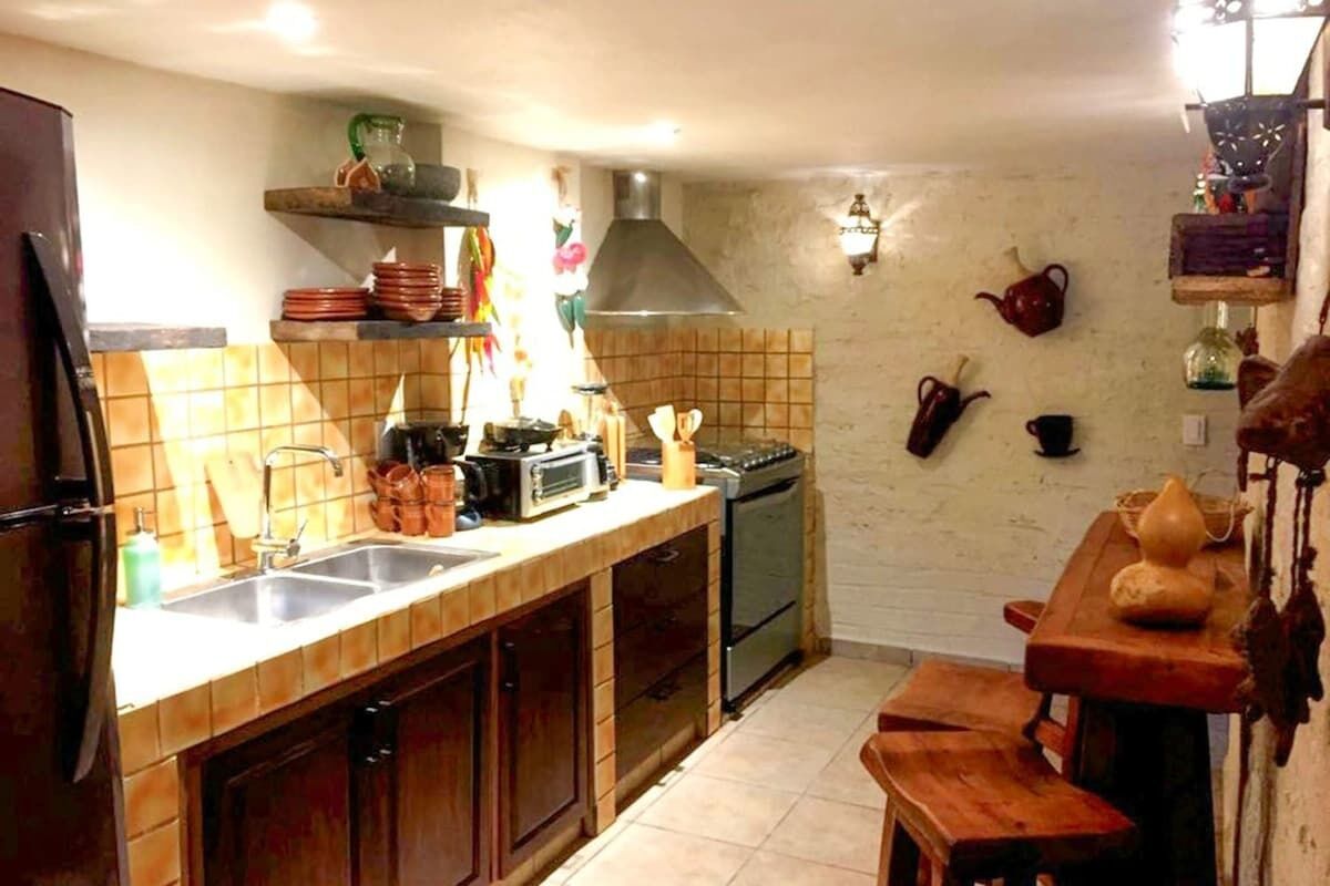 Coffee/tea maker, fridge, microwave, oven