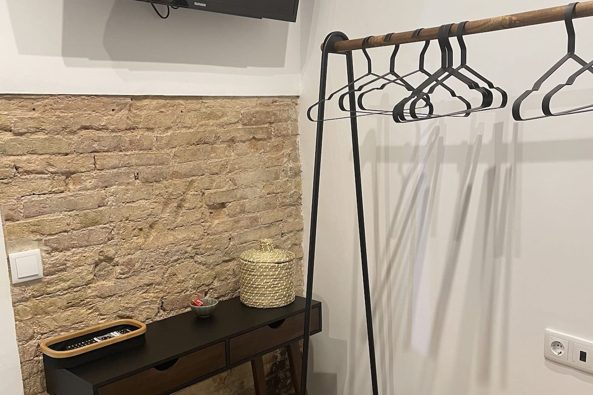 Habitación doble Deluxe, patio, vista al resort | Escritorio, tabla de planchar con plancha y wifi gratis