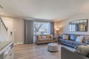 TV, offices - Steps to Lambeau, Stylish 4BR Home (Green Bay)