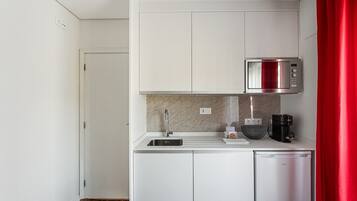 Fridge, microwave, coffee/tea maker, toaster