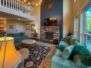 TV, fireplace, table football - Bear Trail Lodge | Views, Games & Bear Sightings (Gatlinburg)