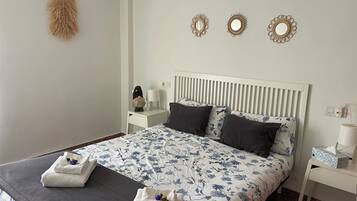 2 dormitorios, tabla de planchar con plancha, wifi y ropa de cama