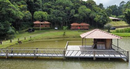 Our cabin at the top of the property with verandah and veranda
