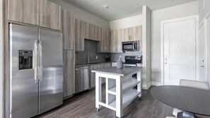 Fridge, microwave, oven, stovetop - Landing | Beautiful 1BD, Gym, Game Room (Austin)