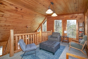 Smart TV, fireplace, books