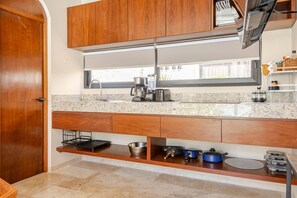 Fridge, microwave, stovetop, coffee/tea maker