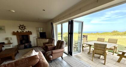 Len's Sandy Collection - 3 Cottages that sleeps 16 guests in 8 bedrooms