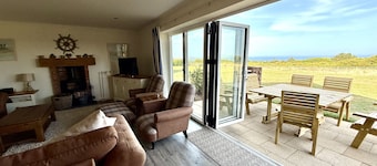 Len's Sandy Collection - 3 Cottages that sleeps 16 guests in 8 bedrooms