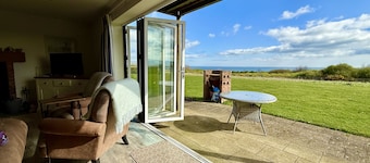 Len's Sandy Collection - 3 Cottages that sleeps 16 guests in 8 bedrooms