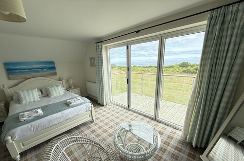 Len's Sandy Collection - 3 Cottages that sleeps 16 guests  in 8 bedrooms