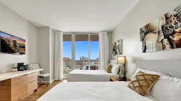 2 dormitorios, tabla de planchar con plancha, cuna de viaje y wifi