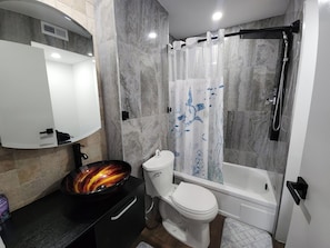 Hair dryer, towels, soap, toilet paper