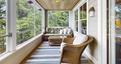 Spectacular lakefront home w/ private dock, beach, swim platform, gazebo & porch