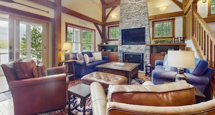Spectacular lakefront home w/ private dock, beach, swim platform, gazebo & porch
