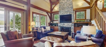 Spectacular lakefront home w/ private dock, beach, swim platform, gazebo & porch